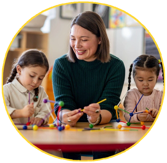 Teacher and children doing STEM activity in a special education class.