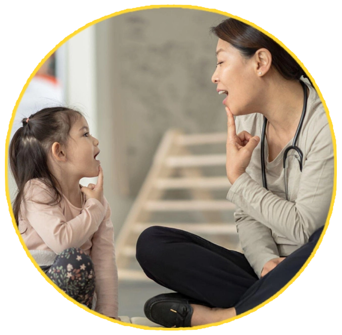 Speech therapy session with child practicing articulation.